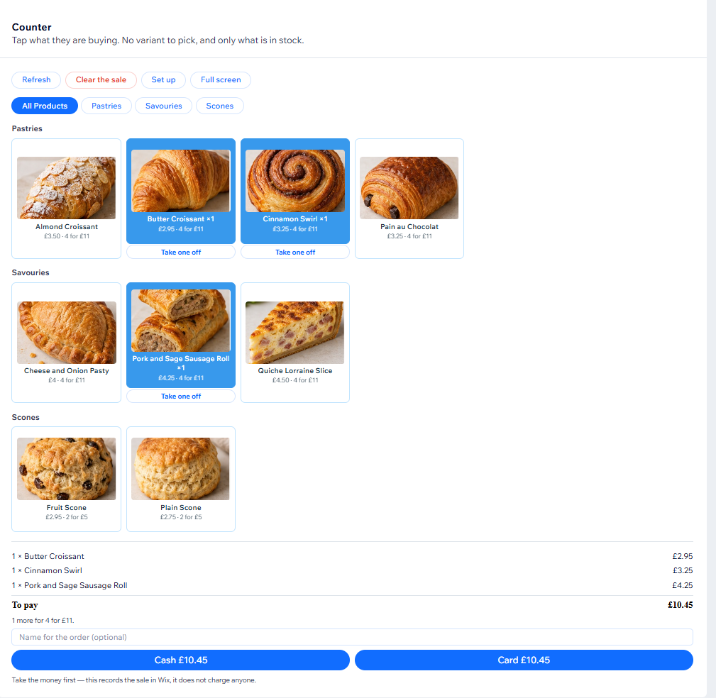 The counter till with product photos: Butter Croissant, Cinnamon Swirl and a Pork and Sage Sausage Roll tapped, the basket totalling £10.45, a prompt that one more makes 4 for £11, and buttons to record the sale as cash or card